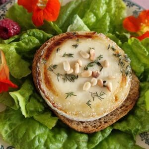 Baked goat cheese, drizzled with honey and served with fresh thyme and toasted pine nuts.
