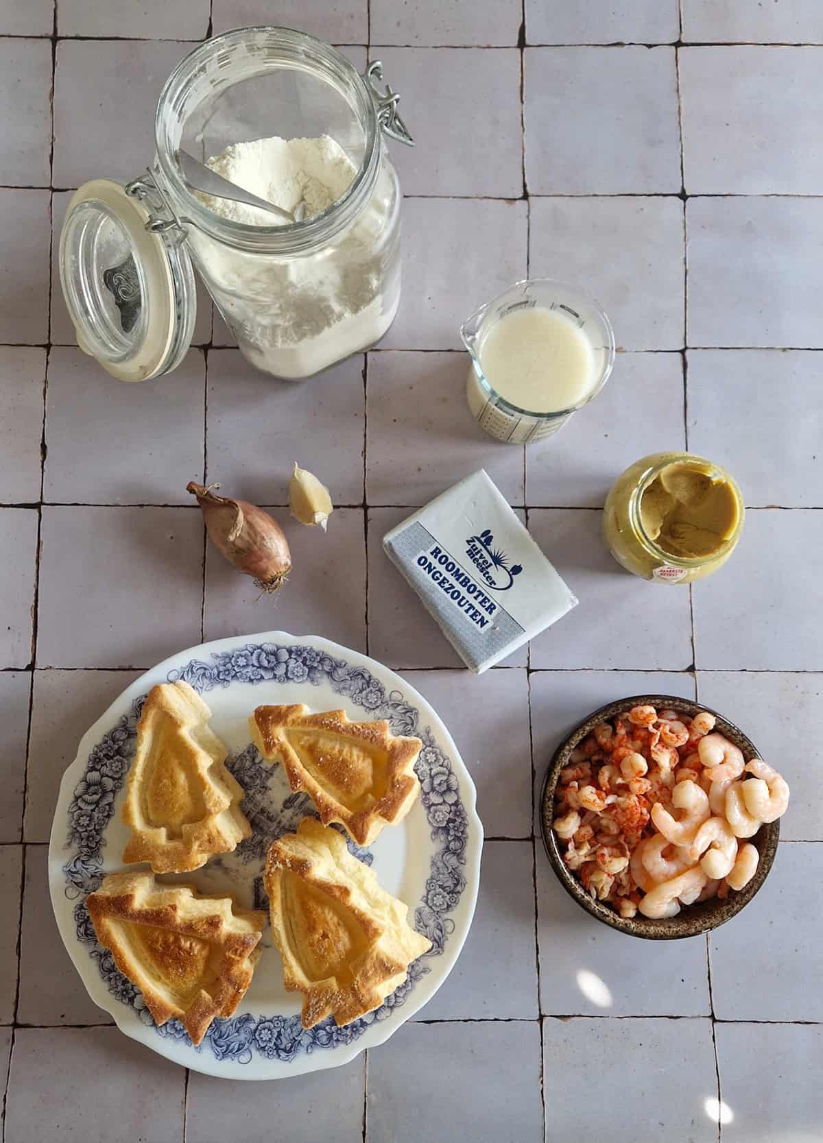 The ingredients for making shrimp ragout, laid out on a table.